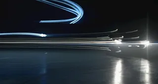 光线粒子尾灯背景图片