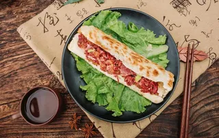 驴肉火烧摄影图图片