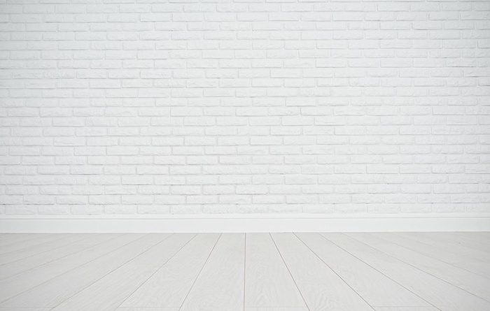 白色空白砖墙和木地板图片