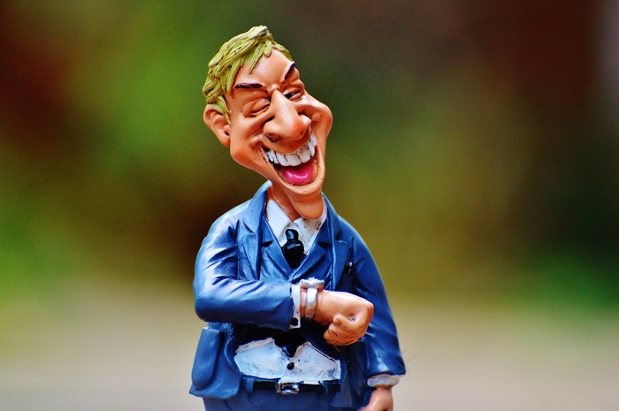 卡通动漫人物,老年人,光头强,面塑,泥人,商人的雕像