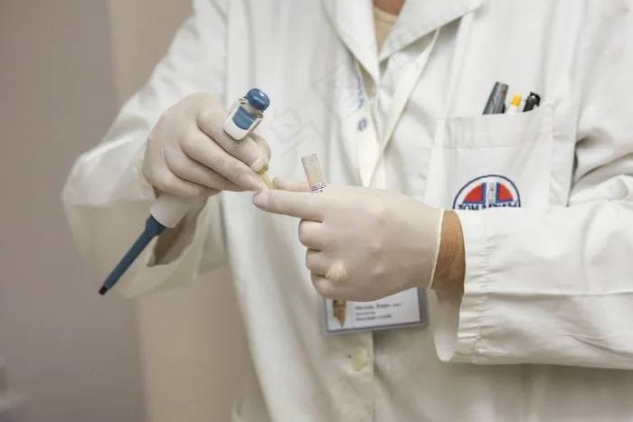 护理人员,医生,中医科,护士,保安服,在医学实验室的医生控股试管