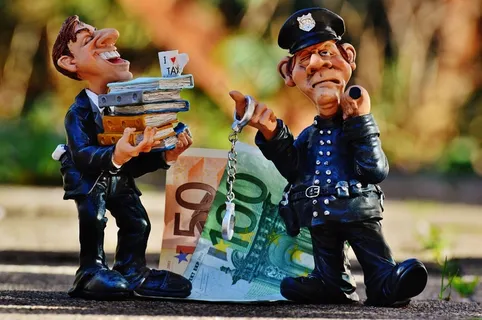 税收，逃税，警察，手铐，骗局