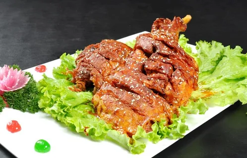 大漠烤羊腿图片